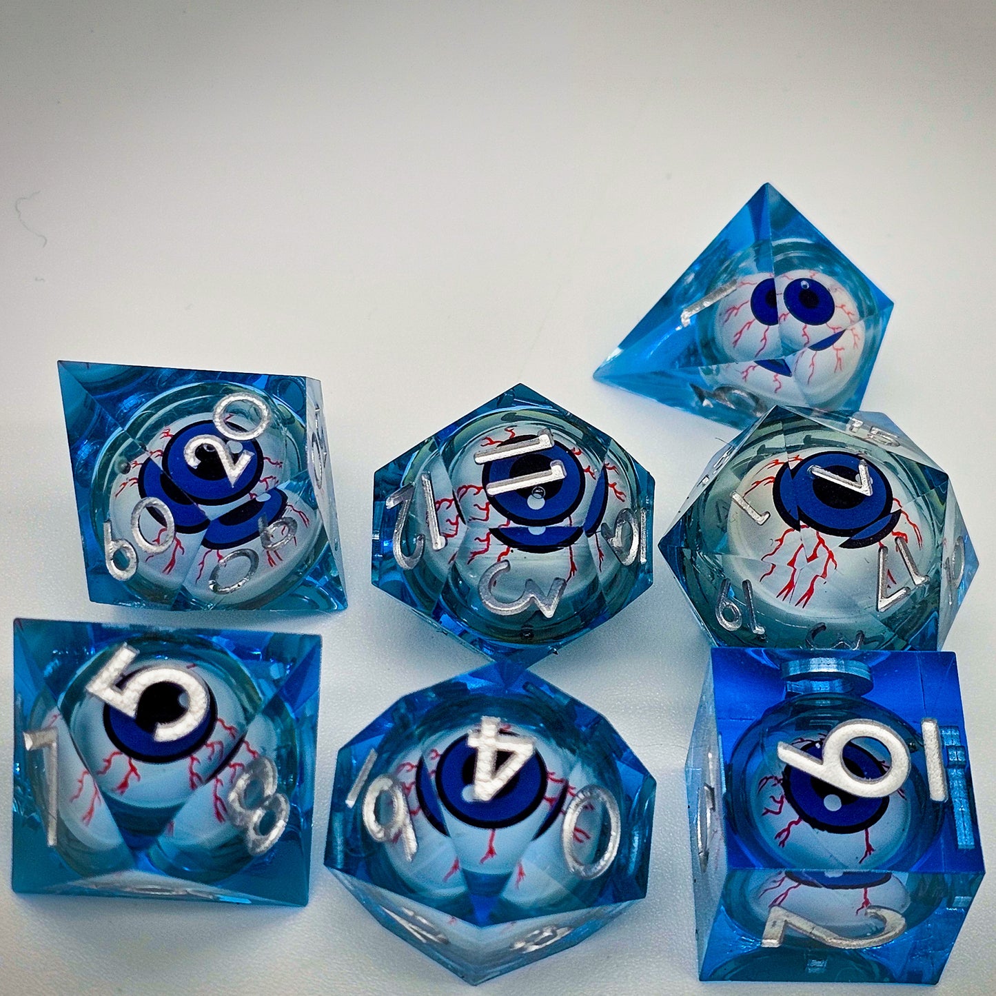 Blue Evil Eye Resin Liquid Core DND Dice Set