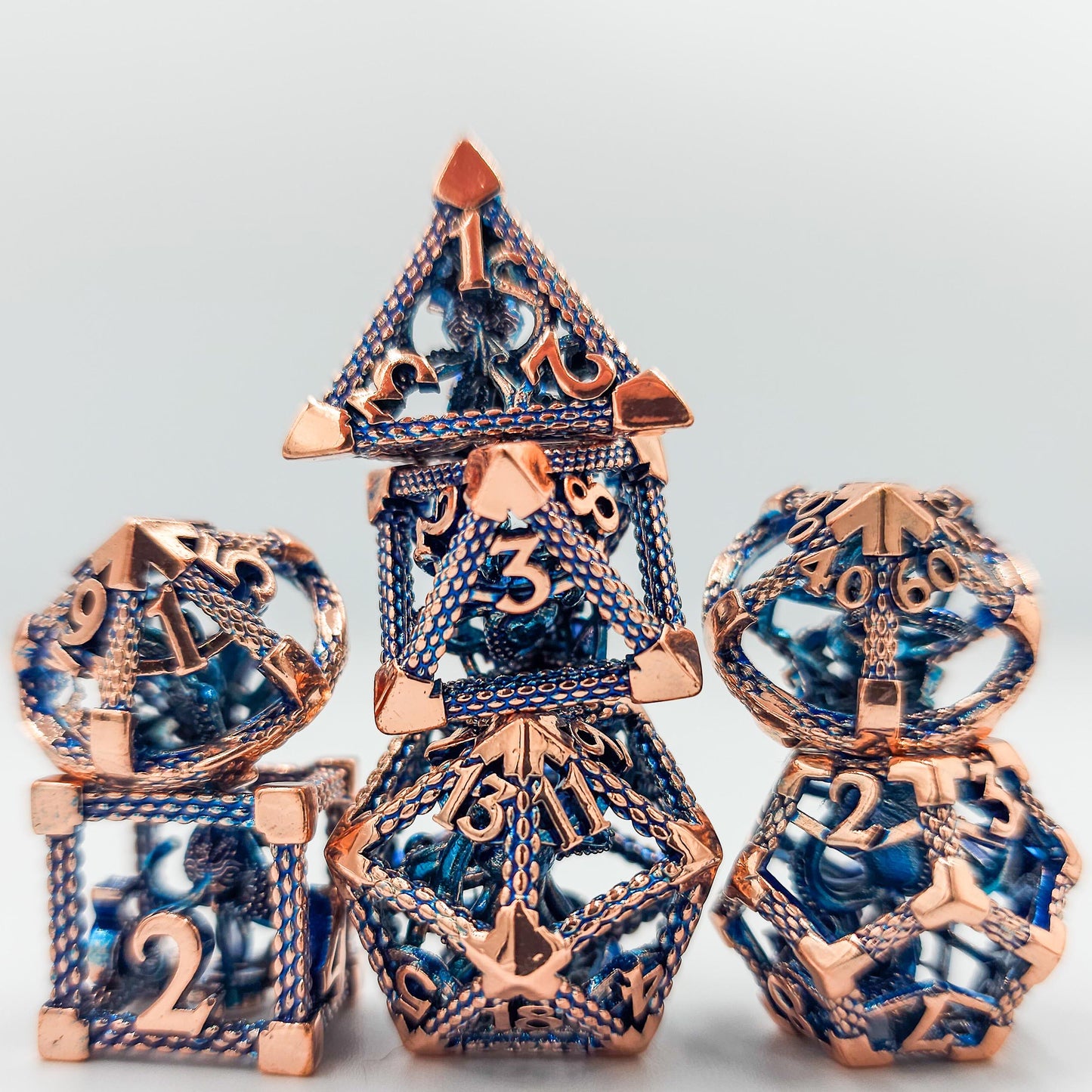Blue & Rose Gold Hollow Metal Cthulhu Dice