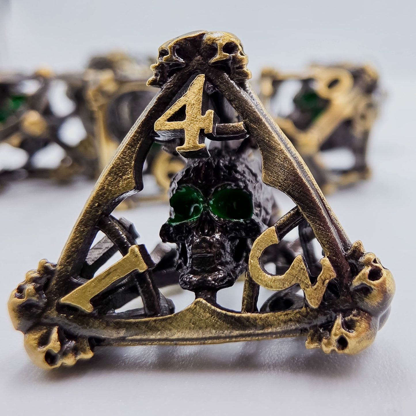 Antique Gold Hollow Metal 3D Skull DND Dice Set