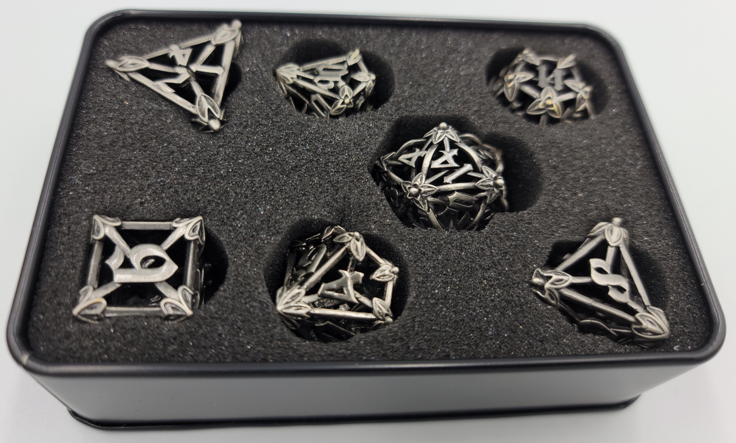 Black/Gray Hollow Metal Caltrops Dice