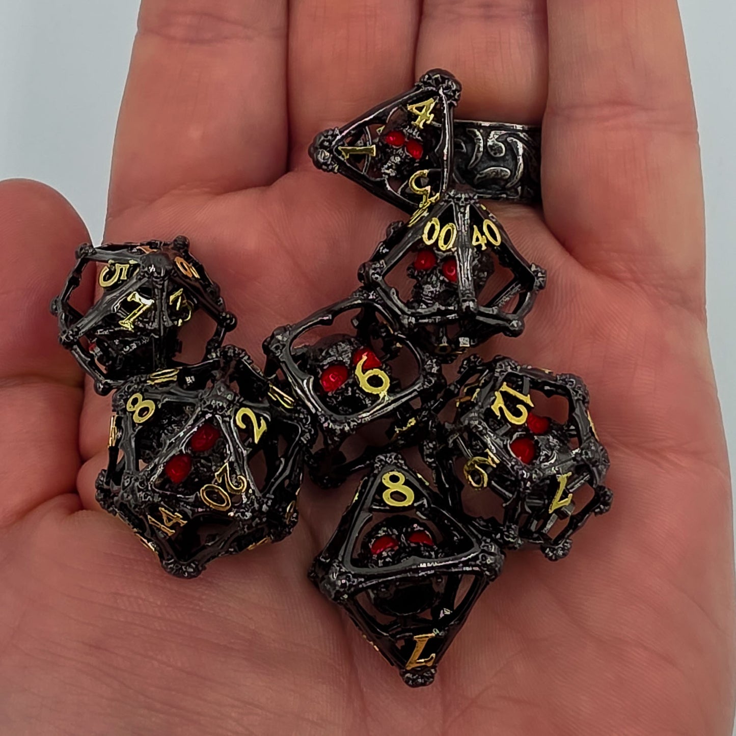 Black & Gold Hollow Metal 3D Skull DND Dice Set