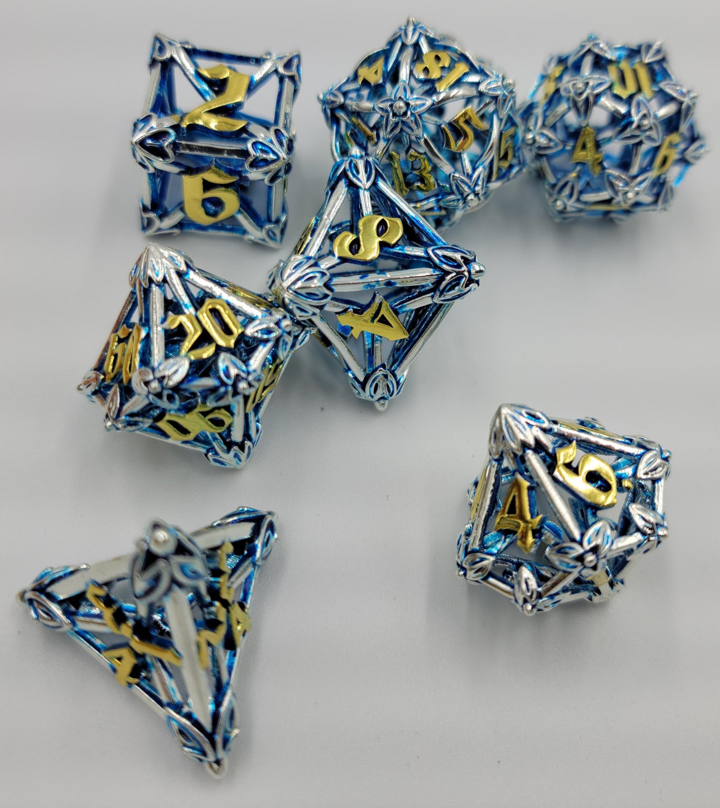 Blue, Silver & Gold Hollow Metal Caltrops Dice