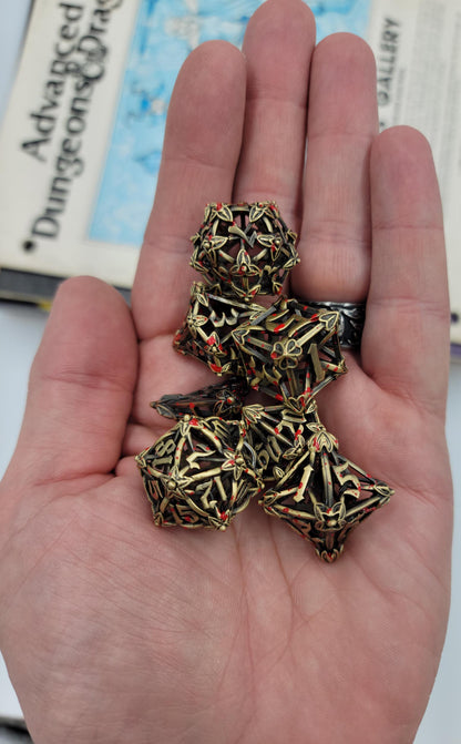 Ancient Gold w/ Blood Splatter Hollow Metal Caltrops Dice