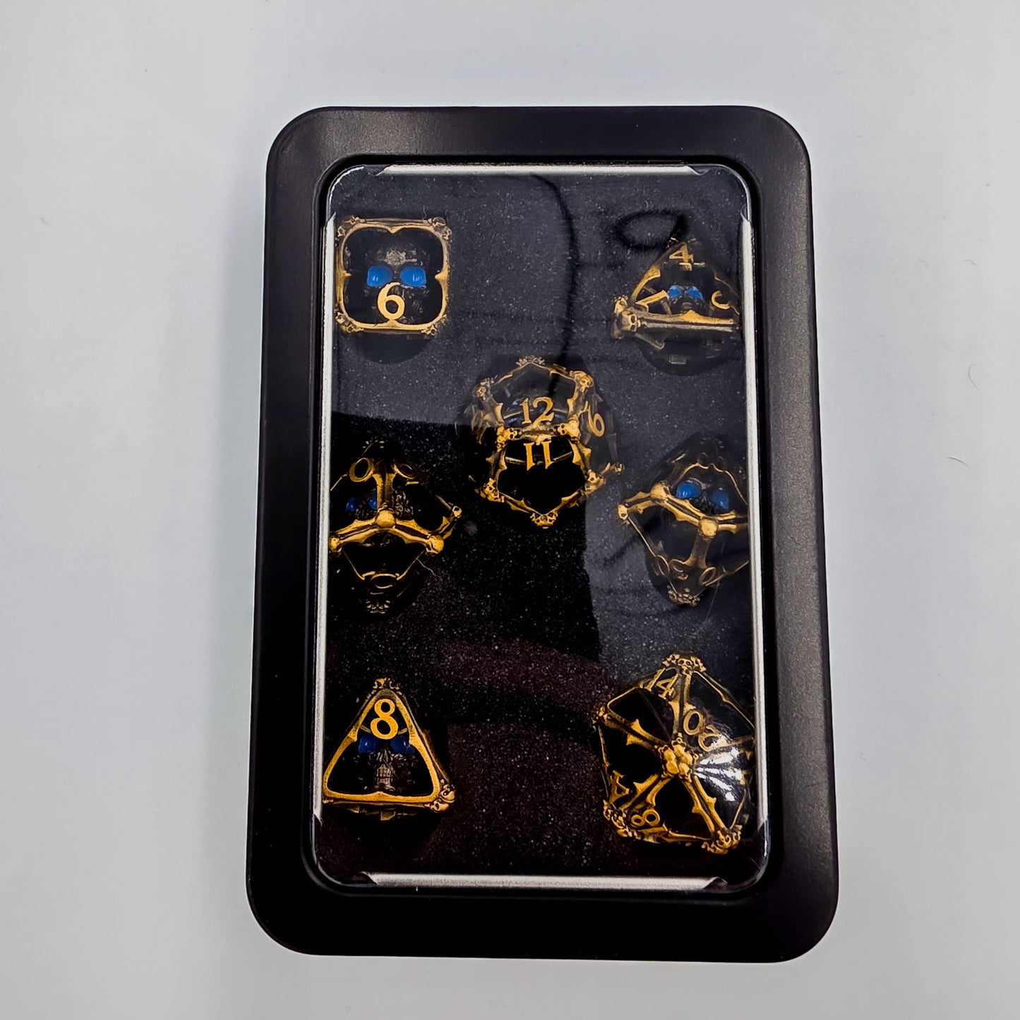 Antique Gold Hollow Metal 3D Skull DND Dice Set