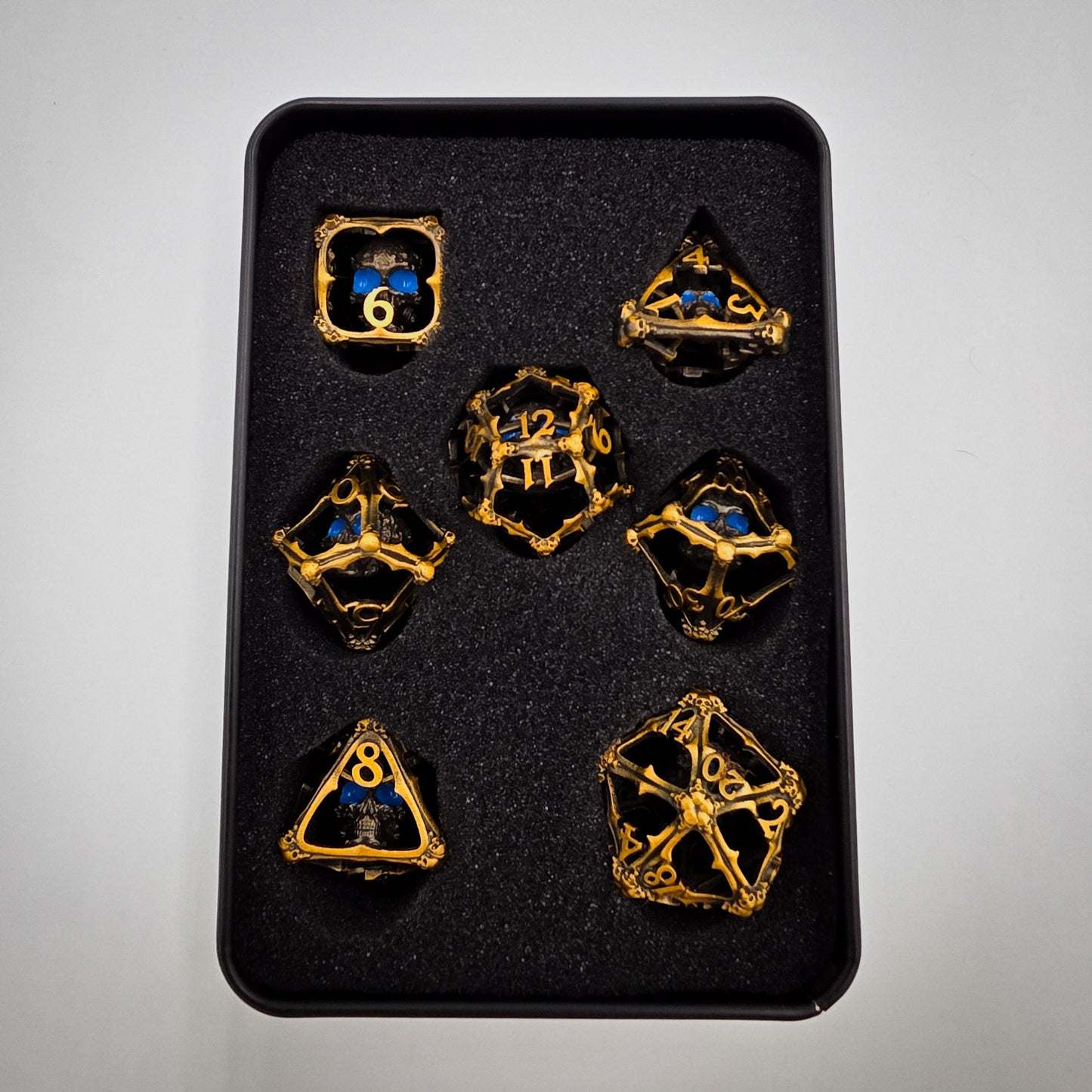 Antique Gold Hollow Metal 3D Skull DND Dice Set