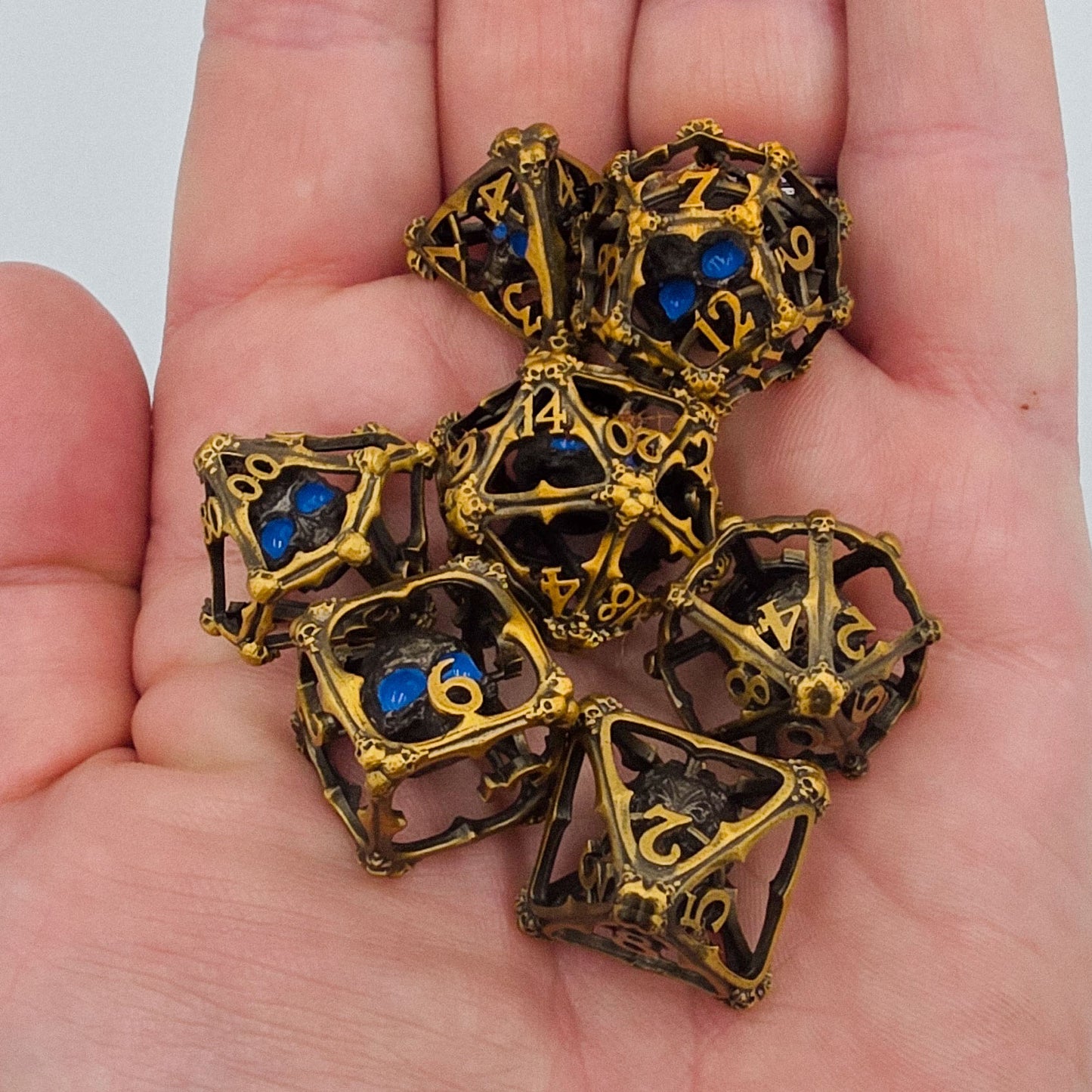 Antique Gold Hollow Metal 3D Skull DND Dice Set