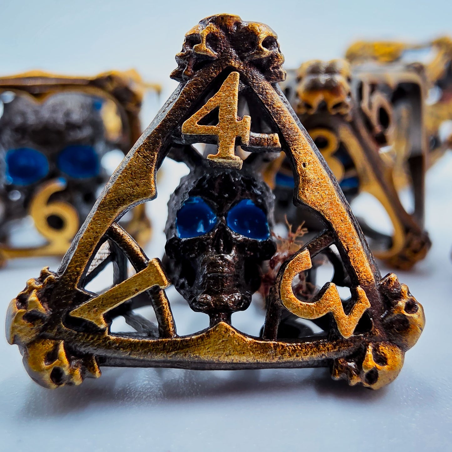 Antique Gold Hollow Metal 3D Skull DND Dice Set