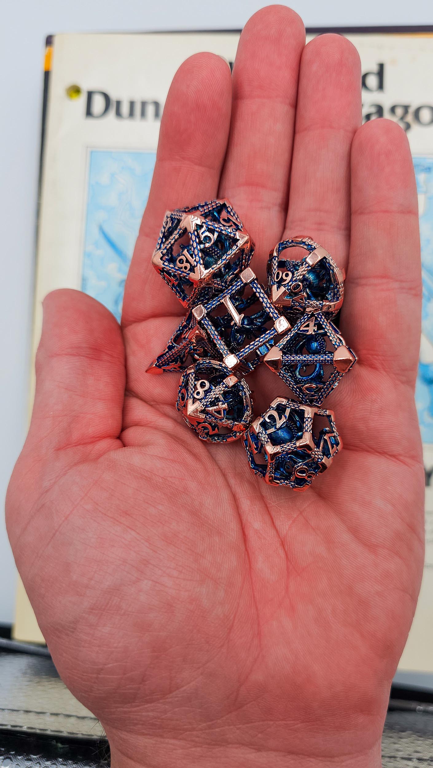 Blue & Rose Gold Hollow Metal Cthulhu Dice