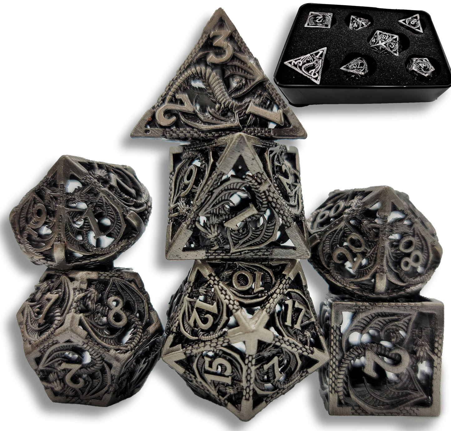 Grey set of dragon themed hollow dnd dice stacked up on a white background.  A black metal container in the top right.