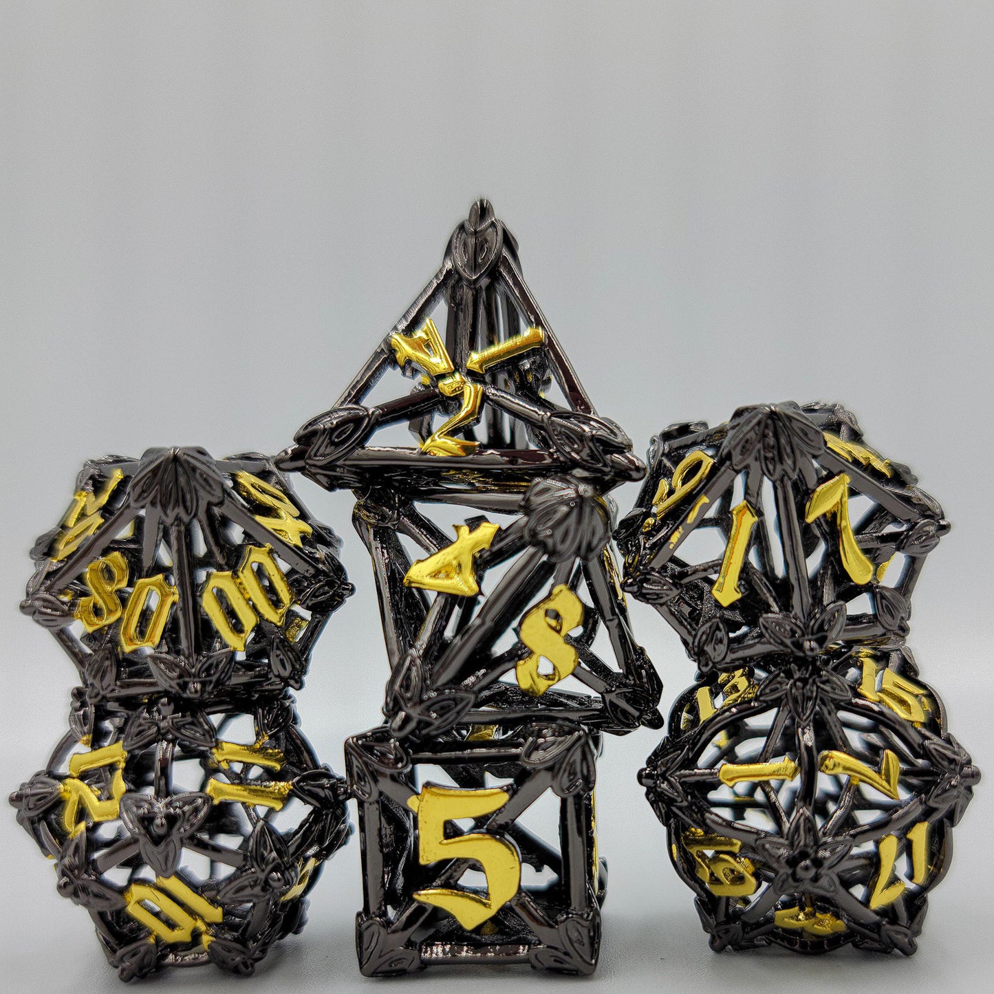 Black & Gold Hollow Metal Caltrops Dice