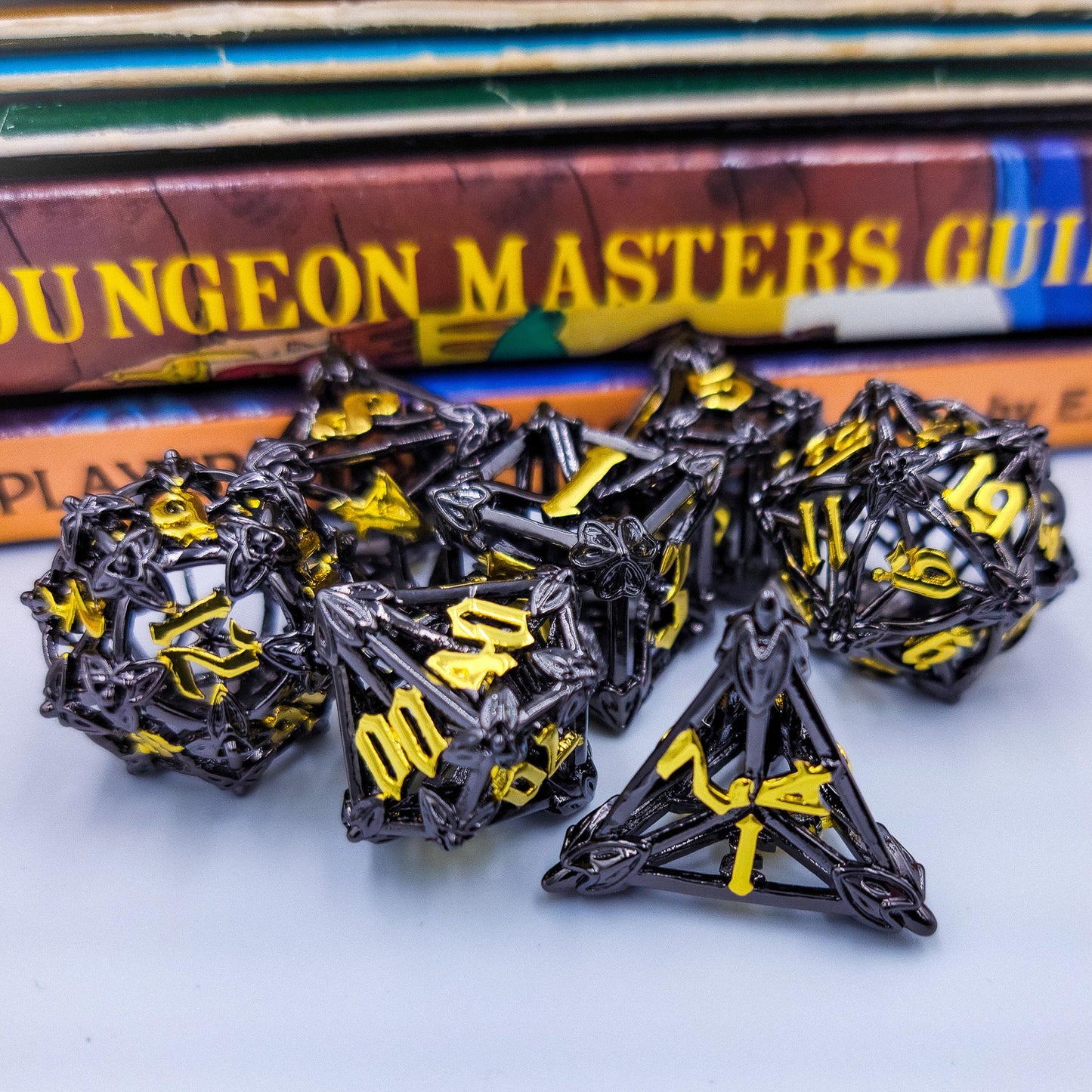 Black & Gold Hollow Metal Caltrops Dice