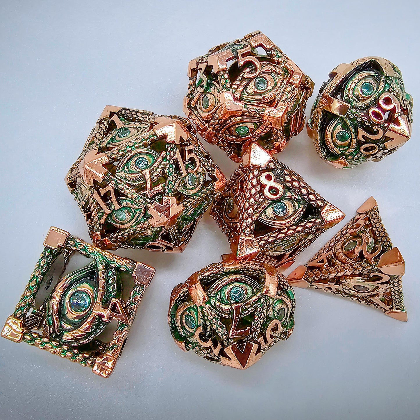 Green & Rose Gold Hollow Metal Illuminati Dice