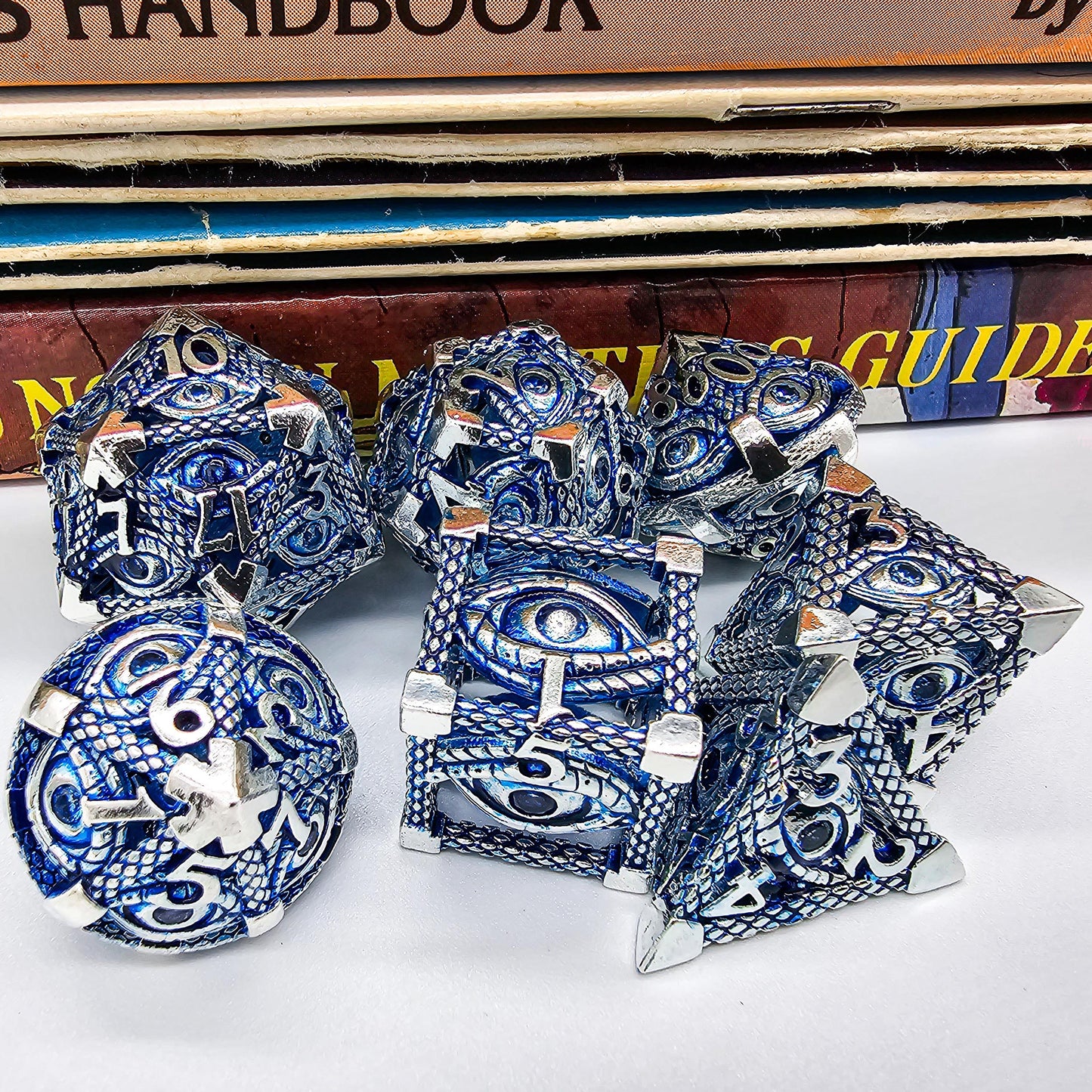 Blue & Silver Hollow Metal Illuminati Dice