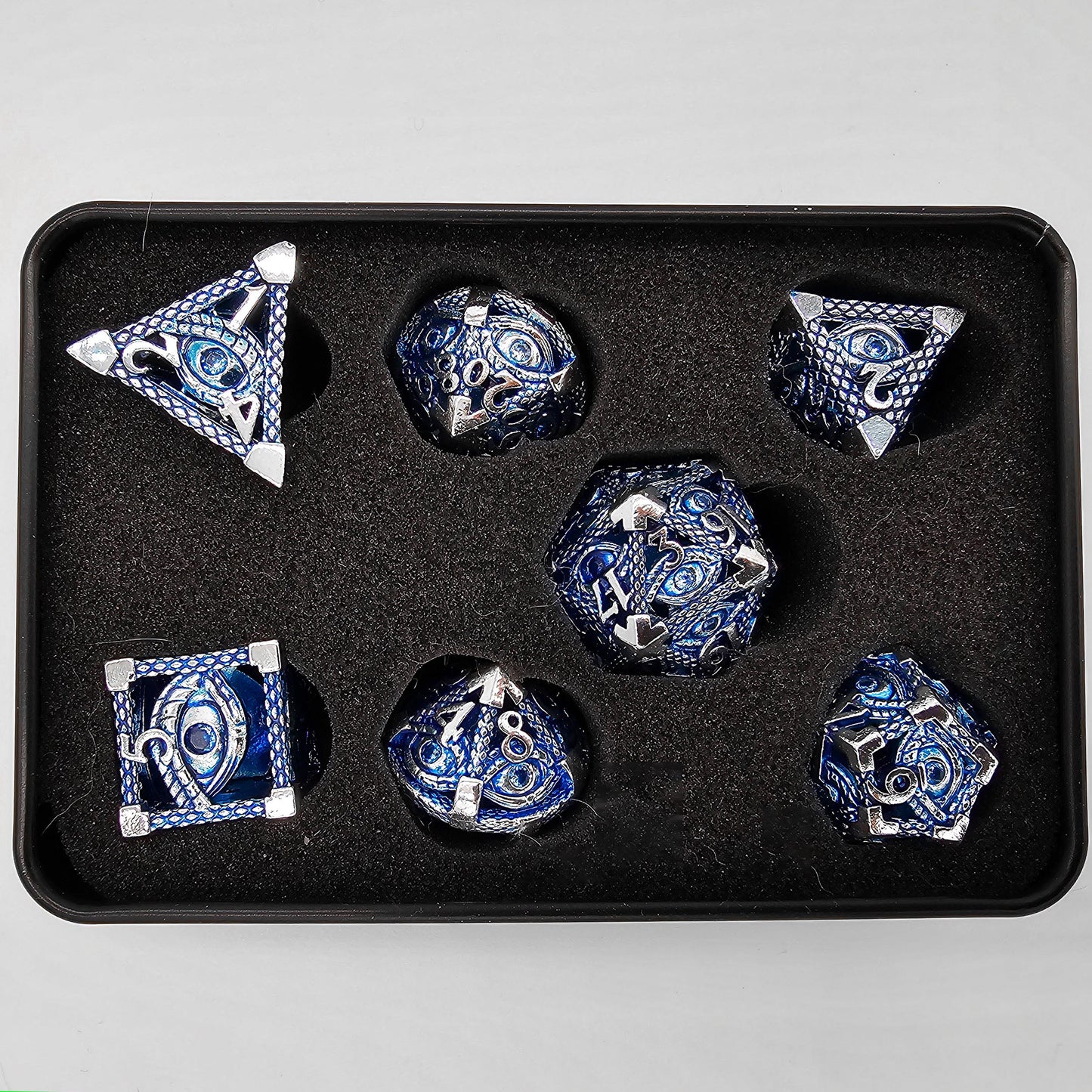 Blue & Silver Hollow Metal Illuminati Dice