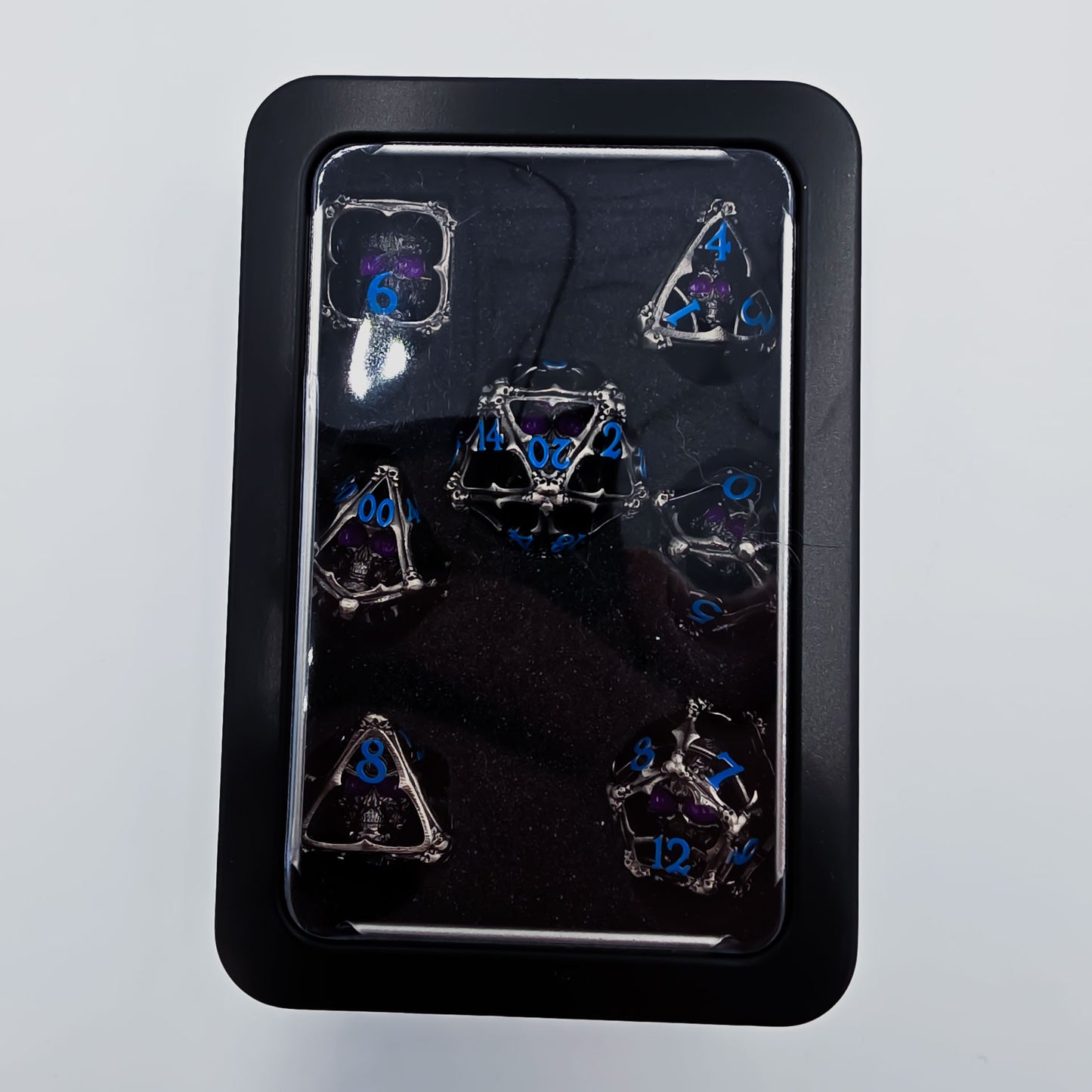 Silver & Blue Hollow Metal 3D Skull DND Dice Set