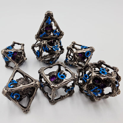 Silver & Blue Hollow Metal 3D Skull DND Dice Set