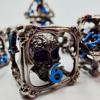 Silver & Blue Hollow Metal 3D Skull DND Dice Set