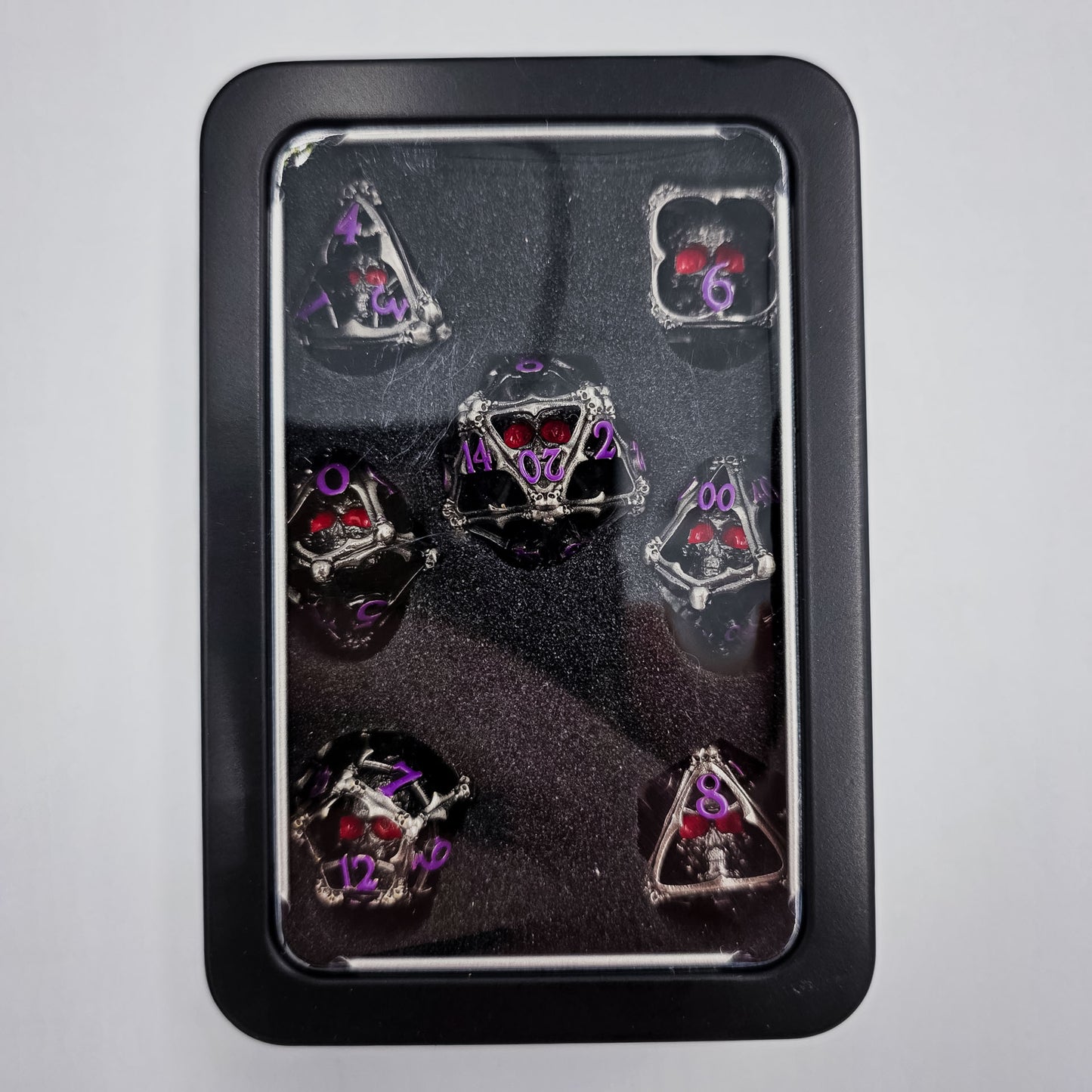 Silver & Purple Hollow Metal 3D Skull DND Dice Set