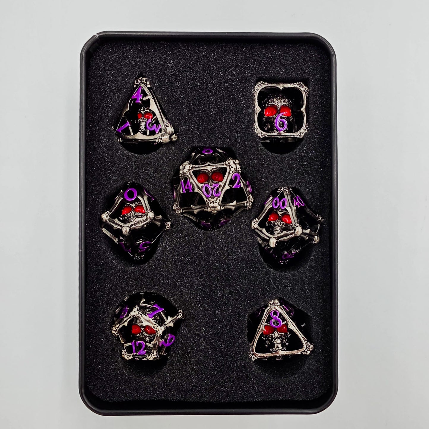 Silver & Purple Hollow Metal 3D Skull DND Dice Set
